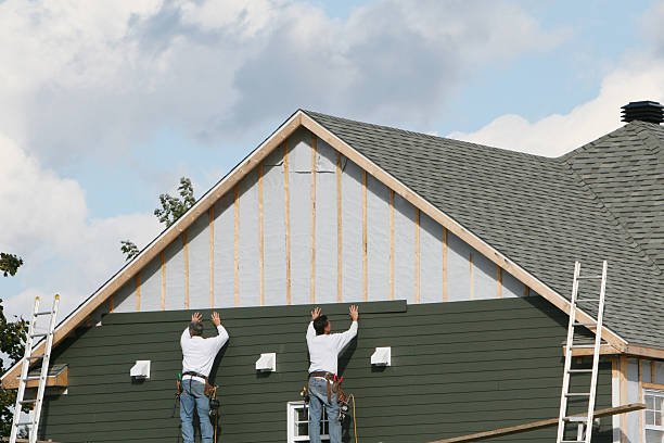 Professional Siding technician working in Platteville, CO